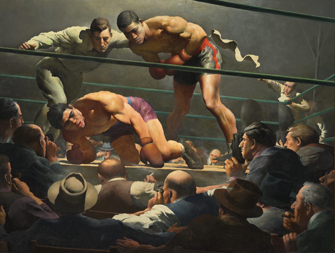 Men boxing in a ring
