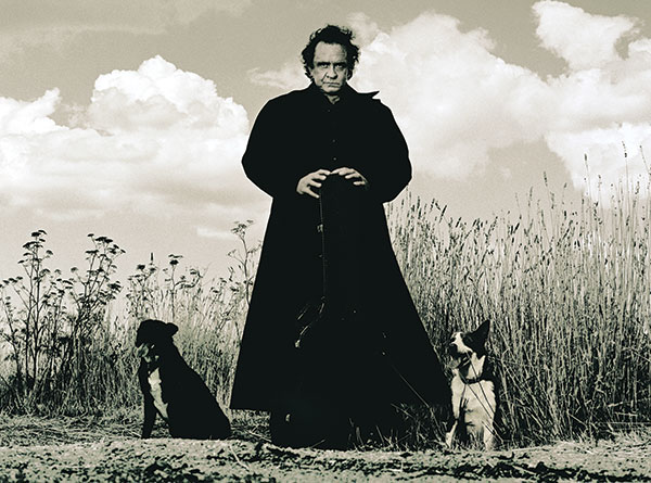 Johnny Cash with two dogs