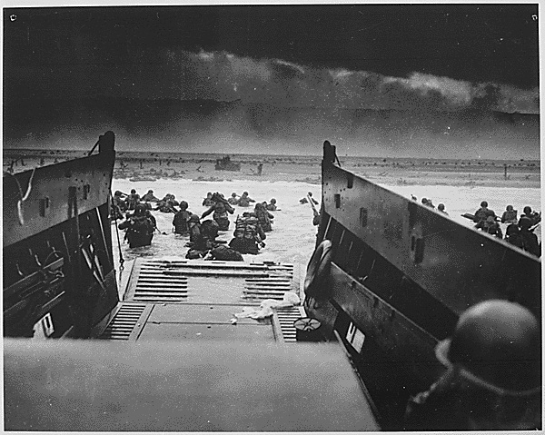 "Into the Jaws of Death – U.S. Troops wading through water and Nazi gunfire." <br />Source: Franklin D. Roosevelt Library