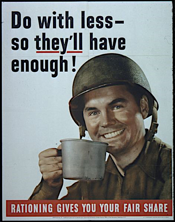 U.S. army G.I. smiling with a cup of coffee.