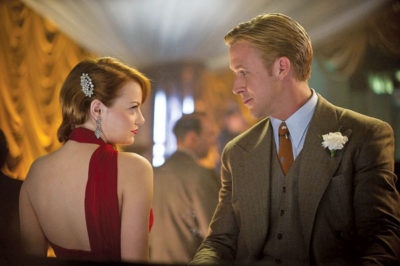 Emma Stone and Ryan Gossling star as mob moll and cop in Gangster Squad (2013). Photo by Wilson Webb/Warner Bros.