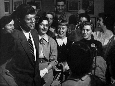 Massachusetts students visit their new senator, John F. Kennedy, whom many women consider the most eligible—and least justifiable—bachelor in the US. Photo by Ollie Atkins.