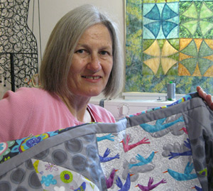 Kym Delmar with her stroller quilt.