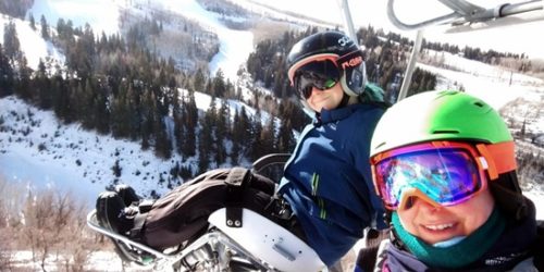 Saylor O'Brien and Lisa Niver on a chair lift.