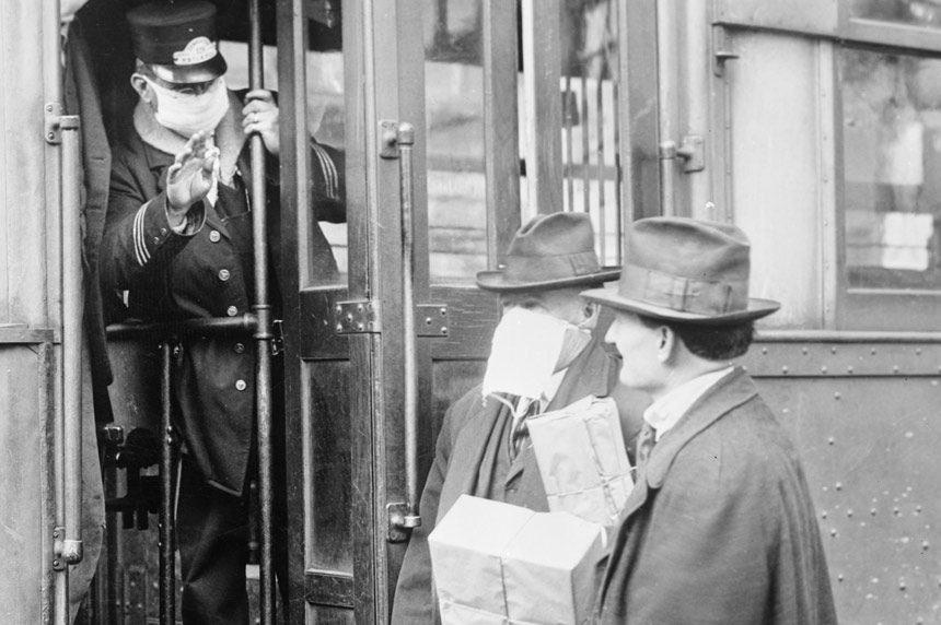 People wear surgical masks as they board a street car during the flu pandemic