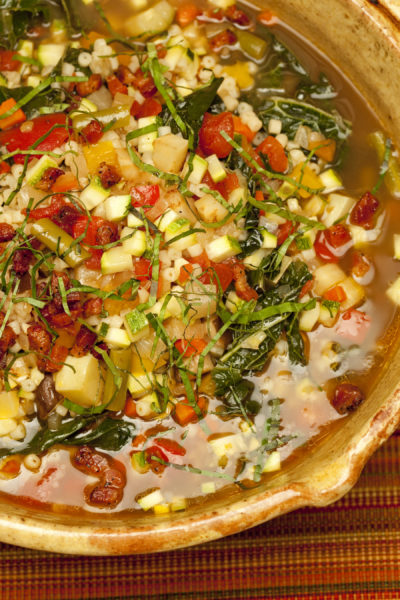A bowl of minestrone soup.