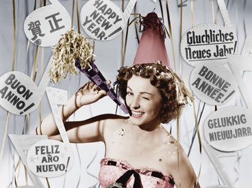 A retro woman in a New Year's Eve party hat with streamers