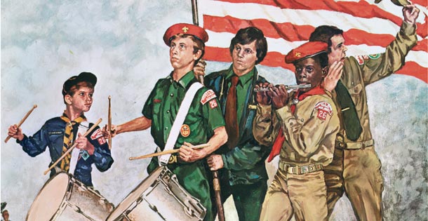 Boy Scouts perfoming a Spirit of '76 essemble in front of an American flag in the wind