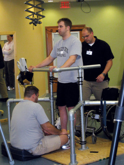 Paralyzed in a hit-and-run accident, Rob Summers is now able to stand and voluntarily move his toes, ankles, knees, and hips on command with the aid of electrical stimulation. Photo Courtesy Rob Summers.