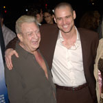 Actor Jim Carrey (right) with comedian Rodney Dangerfield at the world premiere of Carrey's movie Eternal Sunshine of the Spotless Mind, in Beverly Hills, California. March 9, 2004