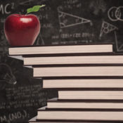 Apple education symbol and stack of books in classroom with written board