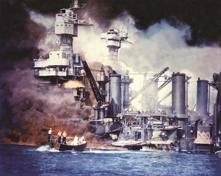 Heroic rescue: Sailors in a motor launch pluck a survivor from the water alongside the burning USS West Virginia during the Japanese air raid on Pearl Harbor. 