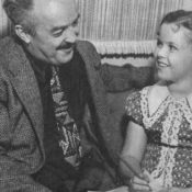 Child star Shirley Temple and The Saturday Evening Post editor J.P. McEvoy in 1938. This photo accompanied the article, "Little Miss Miracle." © SEPS 2014
