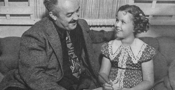 Child star Shirley Temple and The Saturday Evening Post editor J.P. McEvoy in 1938. This photo accompanied the article, "Little Miss Miracle." © SEPS 2014