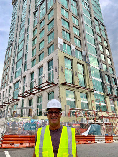 Saturday Evening Post Editorial Director Steve Slon outside of the Kimpton Hotel Arras construction site, wearing a hard hat.