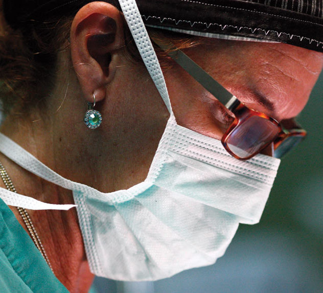 Closeup of Dr. Tammy Neblock-Beirne's face as she is performing surgery.