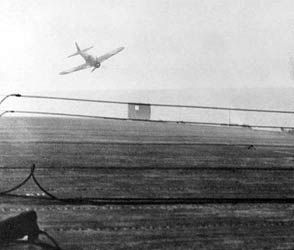 A kamikaze pilot flies toward a collision with the USS White Plains, October 25, 1944.