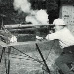 Charles Demport fires the long rifle