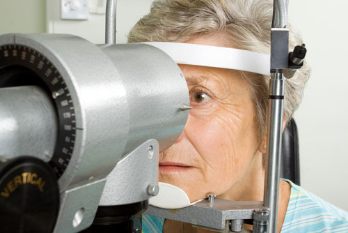 Woman having her eyes checked for Age-Related Macular Degeneration.