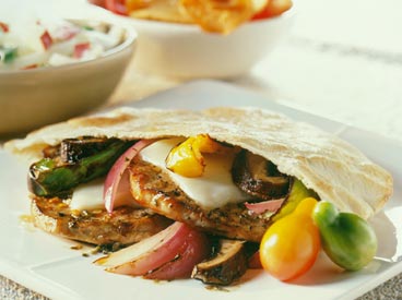 Italian pork, onions, and portobello mushroom stuffed pita