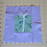 Present Block for Place Mat Quilt. Photo by Kym Delmar.