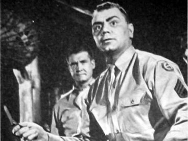 Ernest Borgnine, as Sgt. Fatso Judson, armed with cold steel and ready to fight.