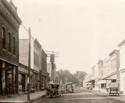 View of the same street in downtown Carlisle (Carlisle Star on left), circa 1920