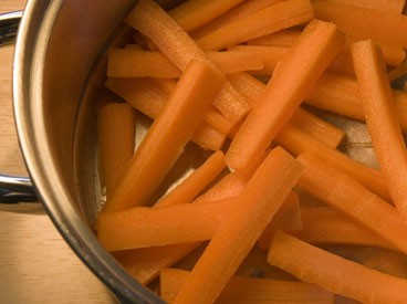 julienne carrot strips in pan