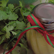 Jar of Cilantro-Mustard Dressing from Iron Chef Cat Cora pictured with cilantro