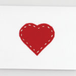 Heart stitched on card