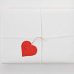 Heart Gift Tag from Craft-a-Day by Sarah Goldschadt heart-shaped gift tag tied onto package