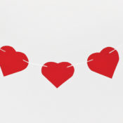 three paper hearts strung together