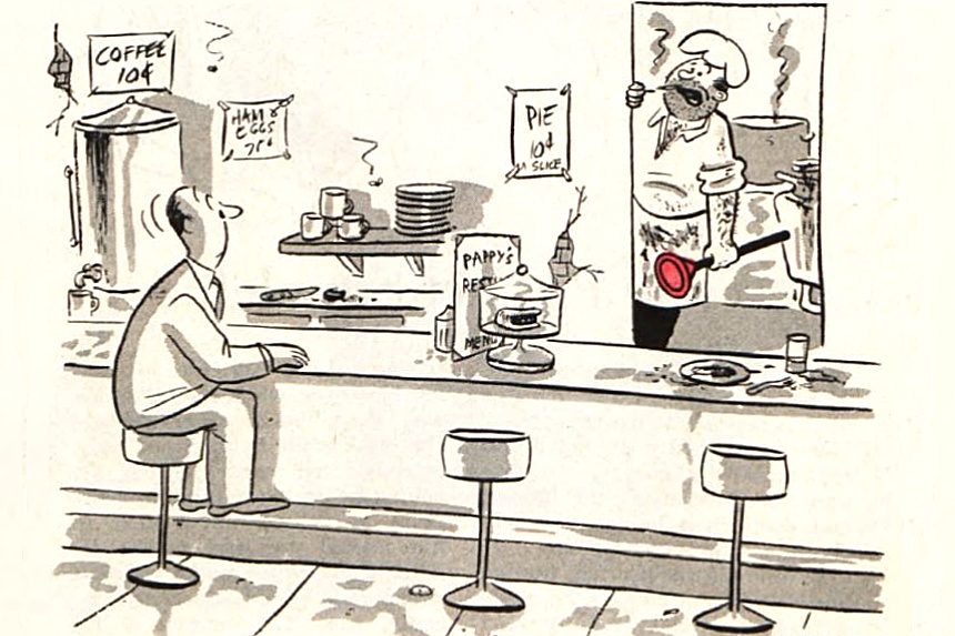 Customer in a diner starts in disbelief at the cook