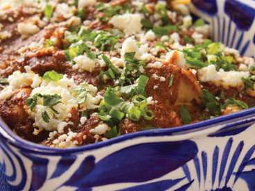 Emeril Lagasse's slow-cooker layered chicken enchiladas