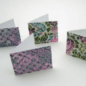 four fabric-covered cards