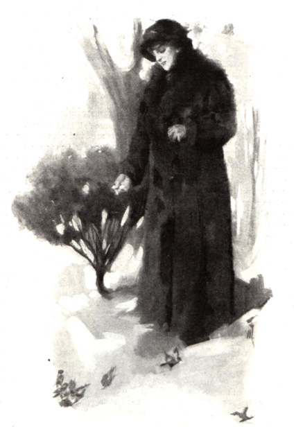 Woman wearing a fur coat and hat.