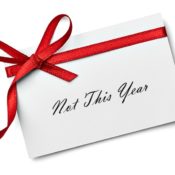 A gift card marked "Not This Year", wrapped with a bow.