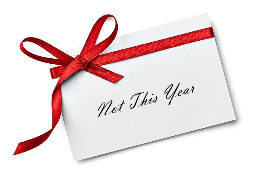 A gift card marked "Not This Year", wrapped with a bow.