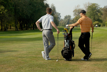 Two men golfing