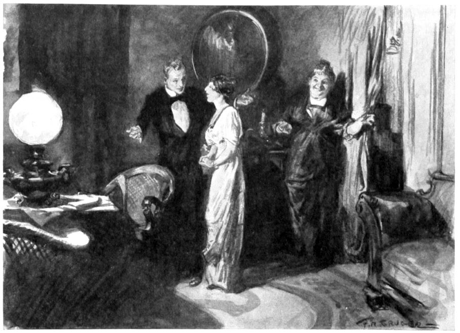 Young man and woman talking while a smiling middle-age lady looks on.