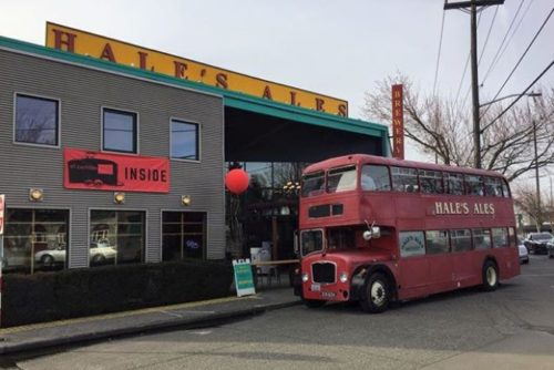 Front of Hales Ales, where a double decker bus can be seen.