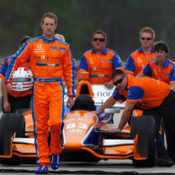 Charlie Kimball and his race team. Photo by Mike Levitt. Courtesy of LAT-USA. All rights reserved.