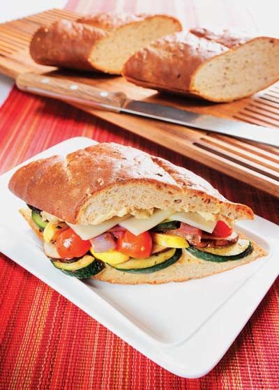 squash, tomato, mushroom, onion, and cheese sandwich