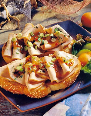 open-faced pork sandwich with apricot sauce