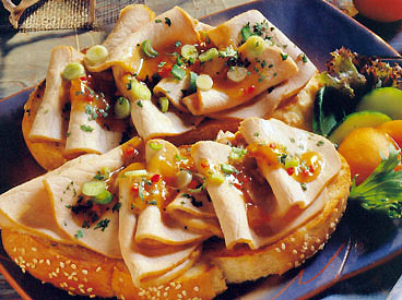 open-faced pork sandwich with apricot sauce