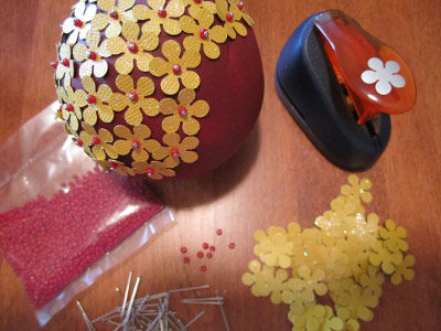 covering ball ornament with punch-flowers, beads, and pins