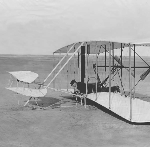 Wilbur Wright piloting the Wright Flyer