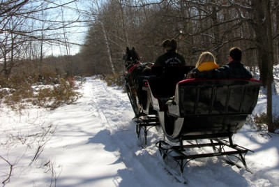 More than a warm-weather destination, winter visitors enjoy open-sleigh rides in Door County.