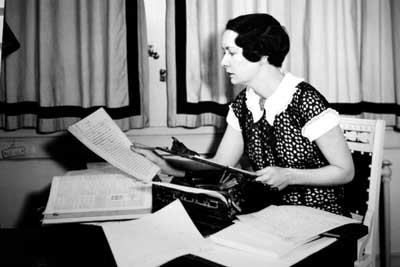 A photo of Mitchell surrounded by her papers is on display at the Margaret Mitchell House.<br />Photo courtesy Betsa Marsh
