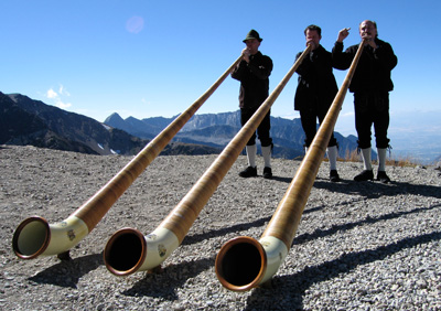 Alpenhorns, traditional horn instruments from the Alps, delight visitors to the Snowbird, Utah Oktoberfest.